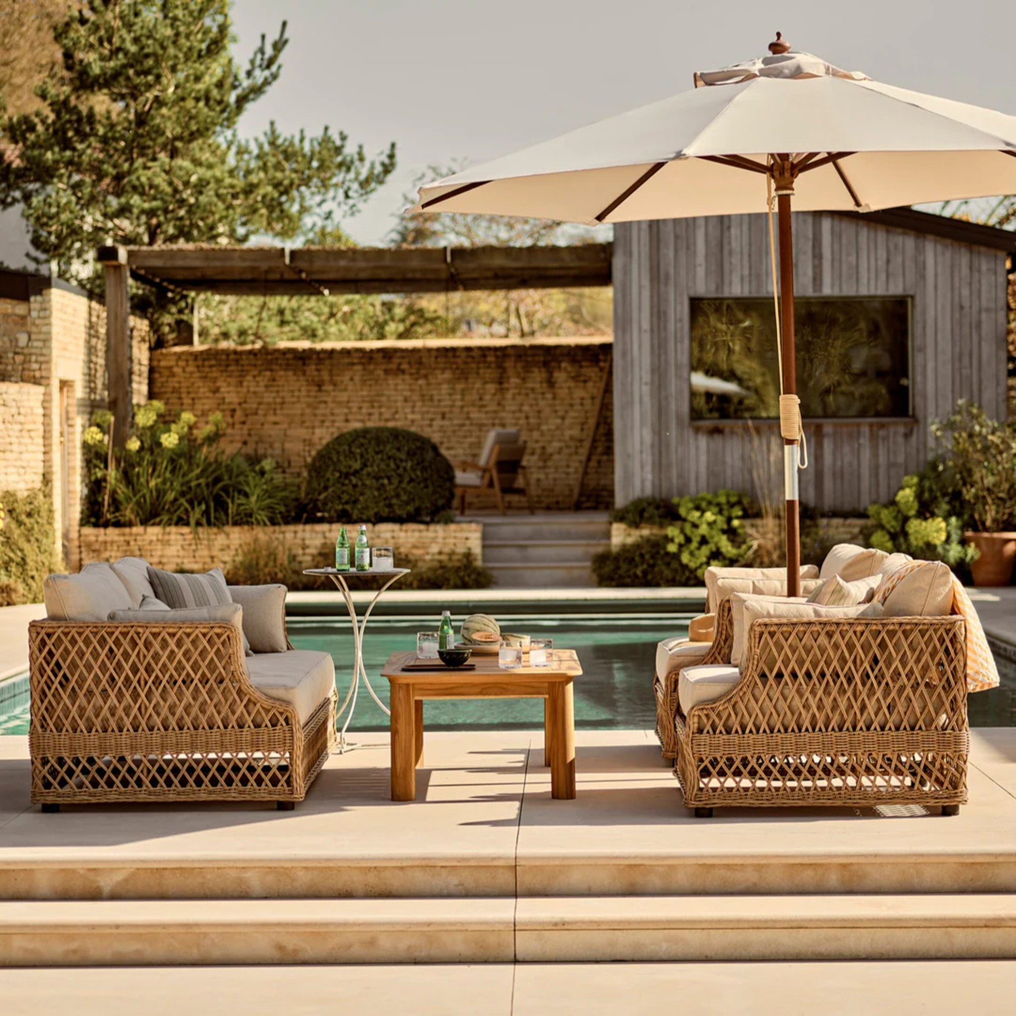 Neptune Longmeadow 4 Seater Wicker Garden Sofa Set with Coffee Table lifestyle