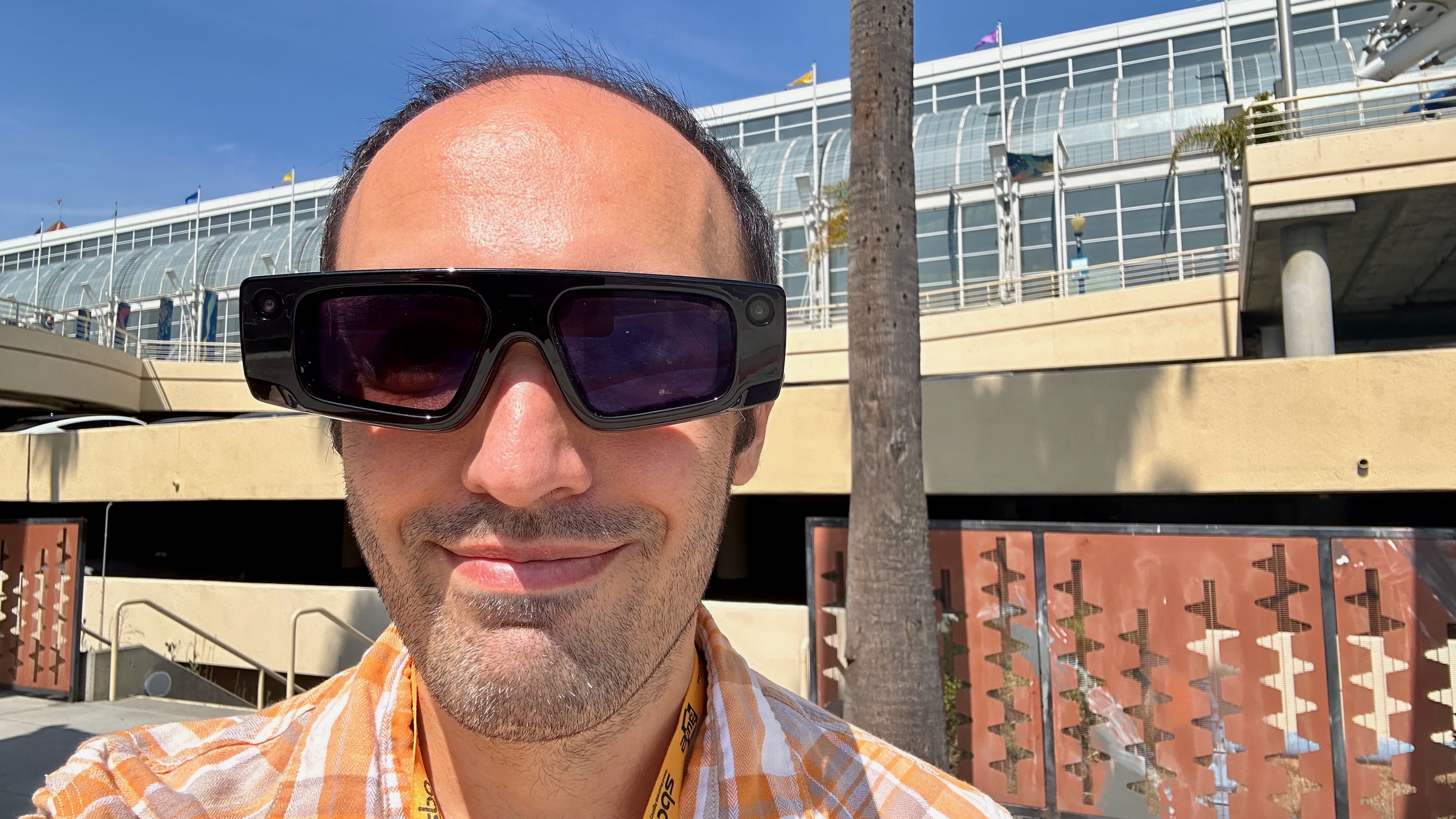 The author wearing Snap Spectacles in AWE 2025 in Long Beach to test a Niantic Spatial Visual Positioning System demo.