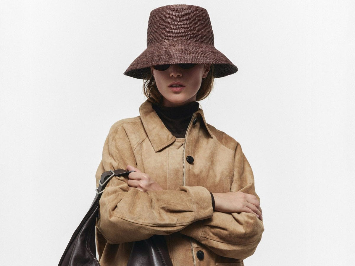 a model wears a Janessa Leone hat