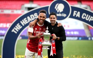 Arsenal manager Mikel Arteta (right) and Pierre-Emerick Aubameyang will continue to work together after the forward signed a new contract.