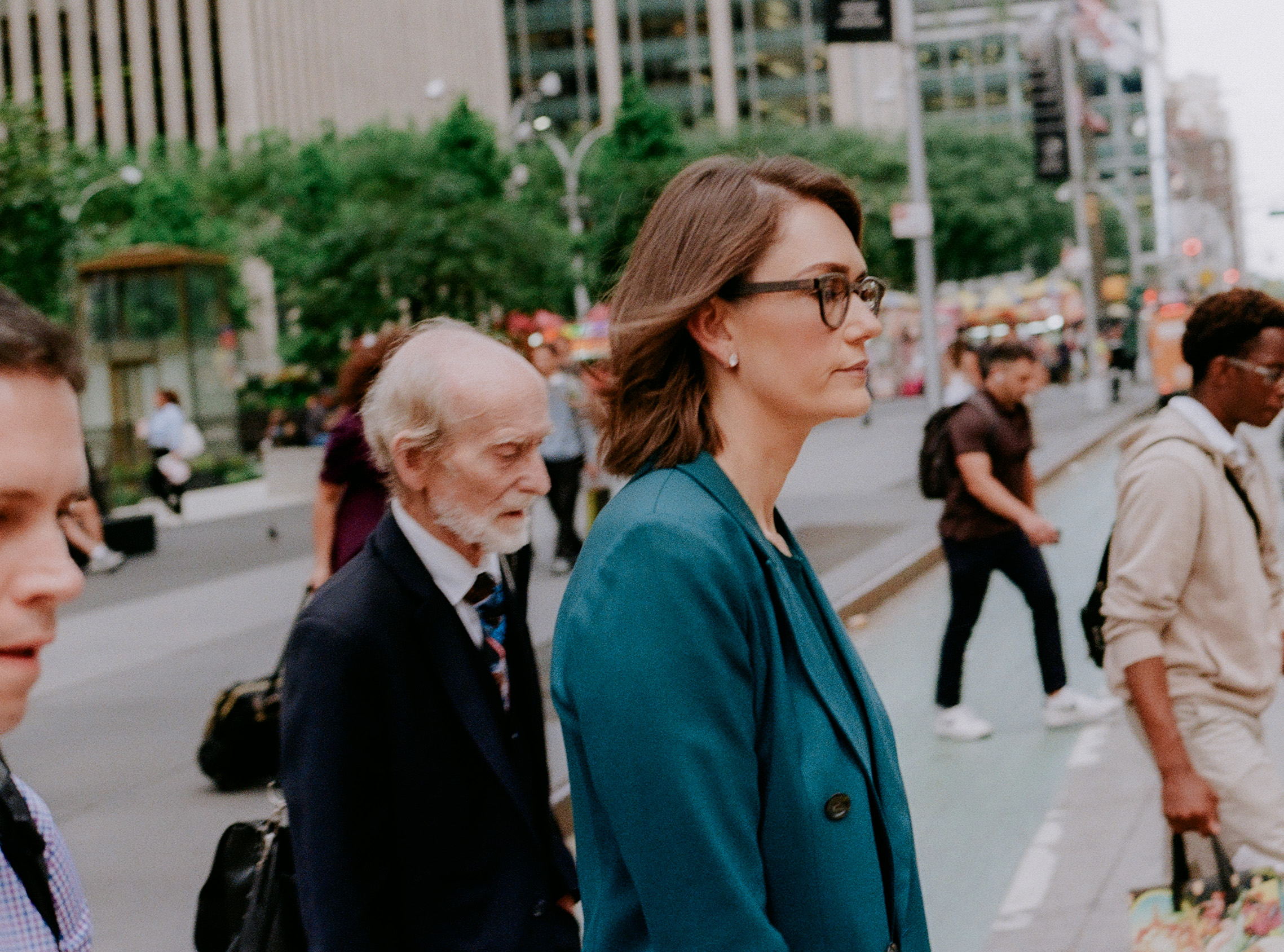 Jessica Tarlov walks along a busy Midtown Manhattan street.