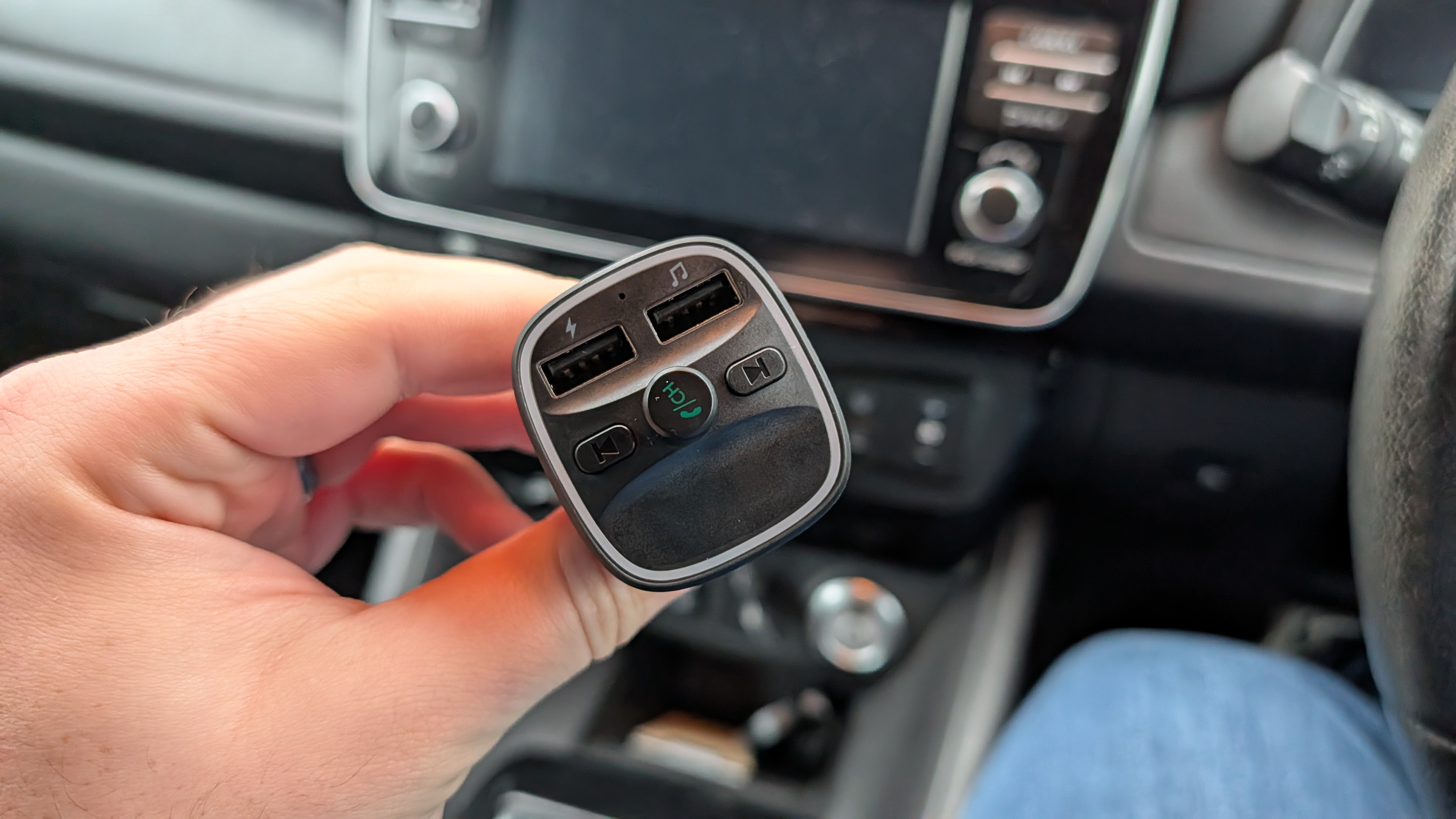 lencent fm transmitter inside a nissan leaf cockpit