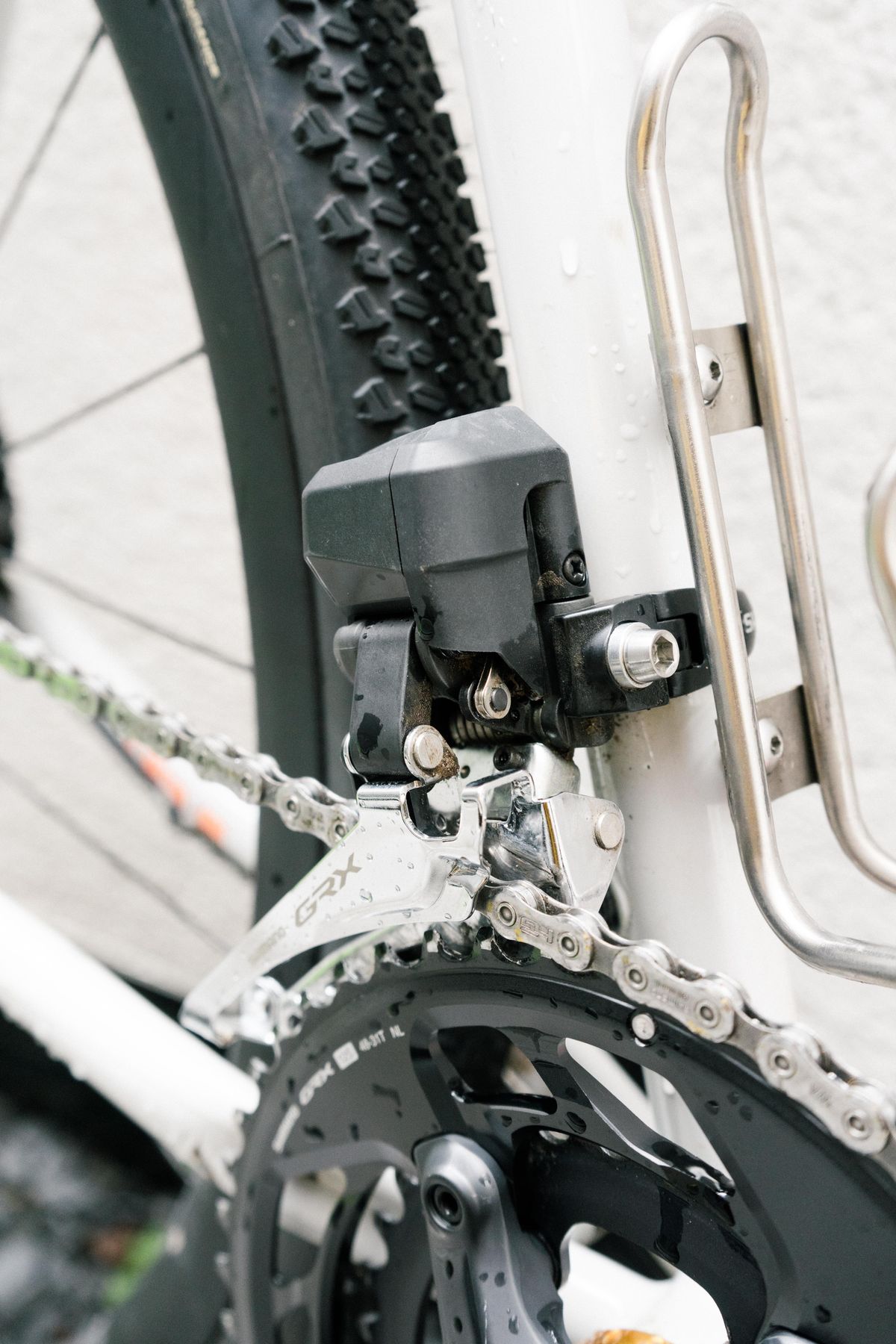 A close up of an electronic front derailleur