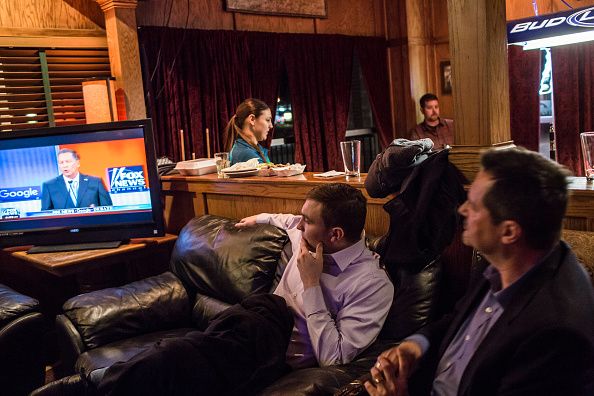 GOP supporters watch the Republican debate. 