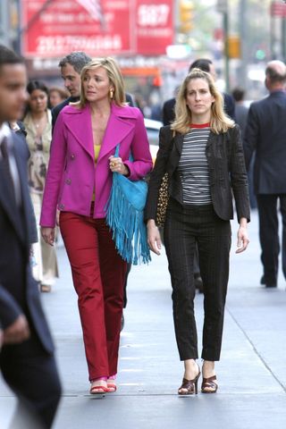 Carrie Bradshaw wearing pinstripe suit