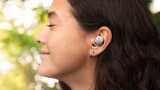 Listing image showing girl wearing Sennheiser Momentum True Wireless 4 earbuds