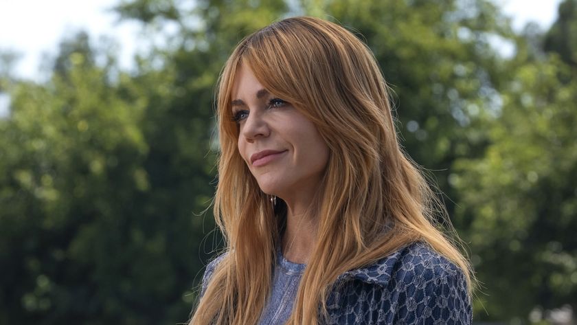 Morgan smiling outside in High Potential Season 2