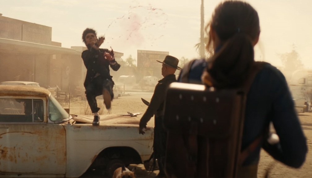 Lucy shooting a ghoul in the Fallout TV series Season 2