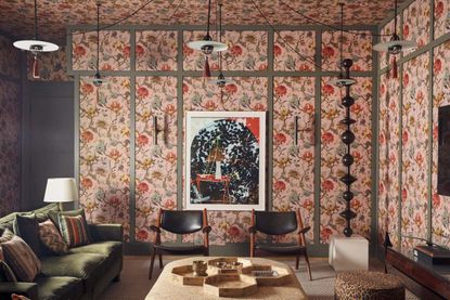 a room with pink wallpapered walls and ceiling