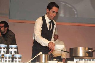 Alberto Contador cooks up a storm at the Giro presentation in Milan