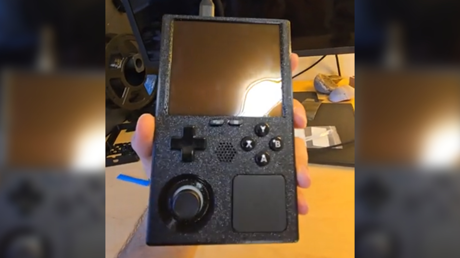 A custom Steam Deck build, where the internals have been placed inside a Game Boy-like frame