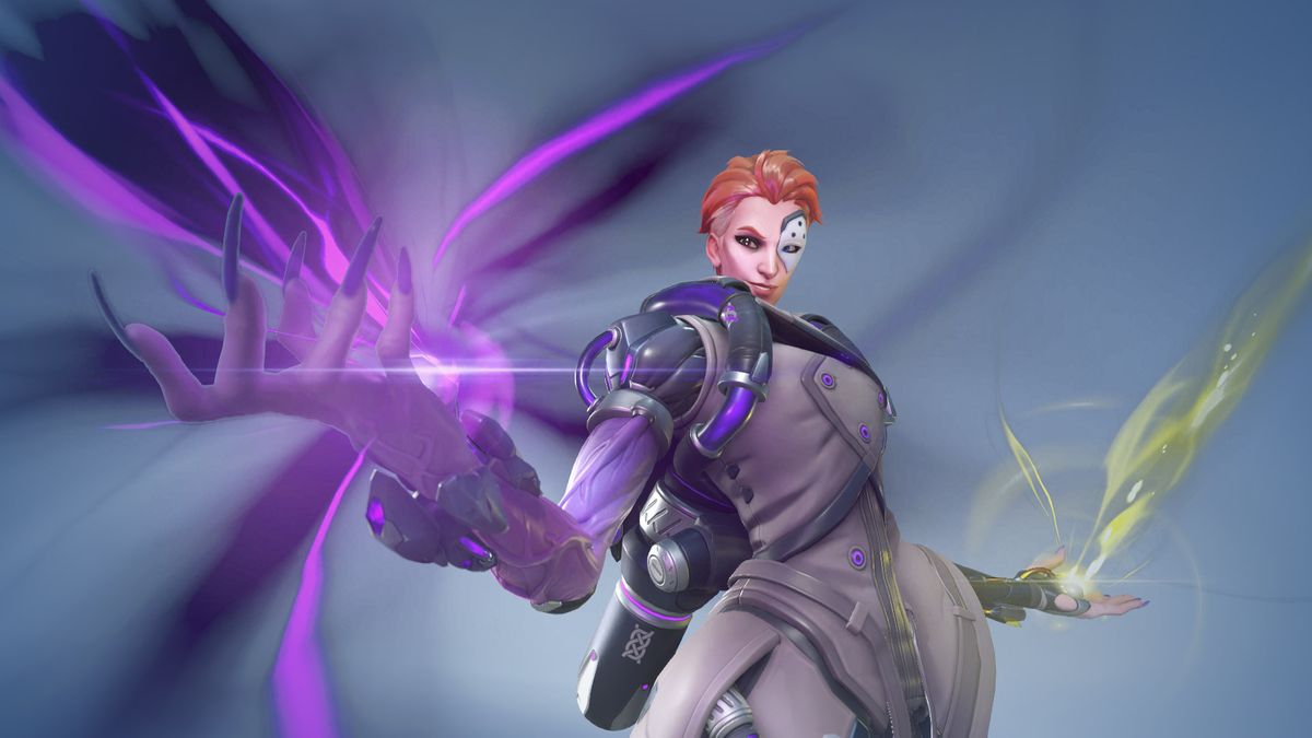 Moira&#039;s in Overwatch two standing using both her weird arms.