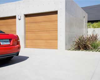 Modern two-car garage with concrete driveway
