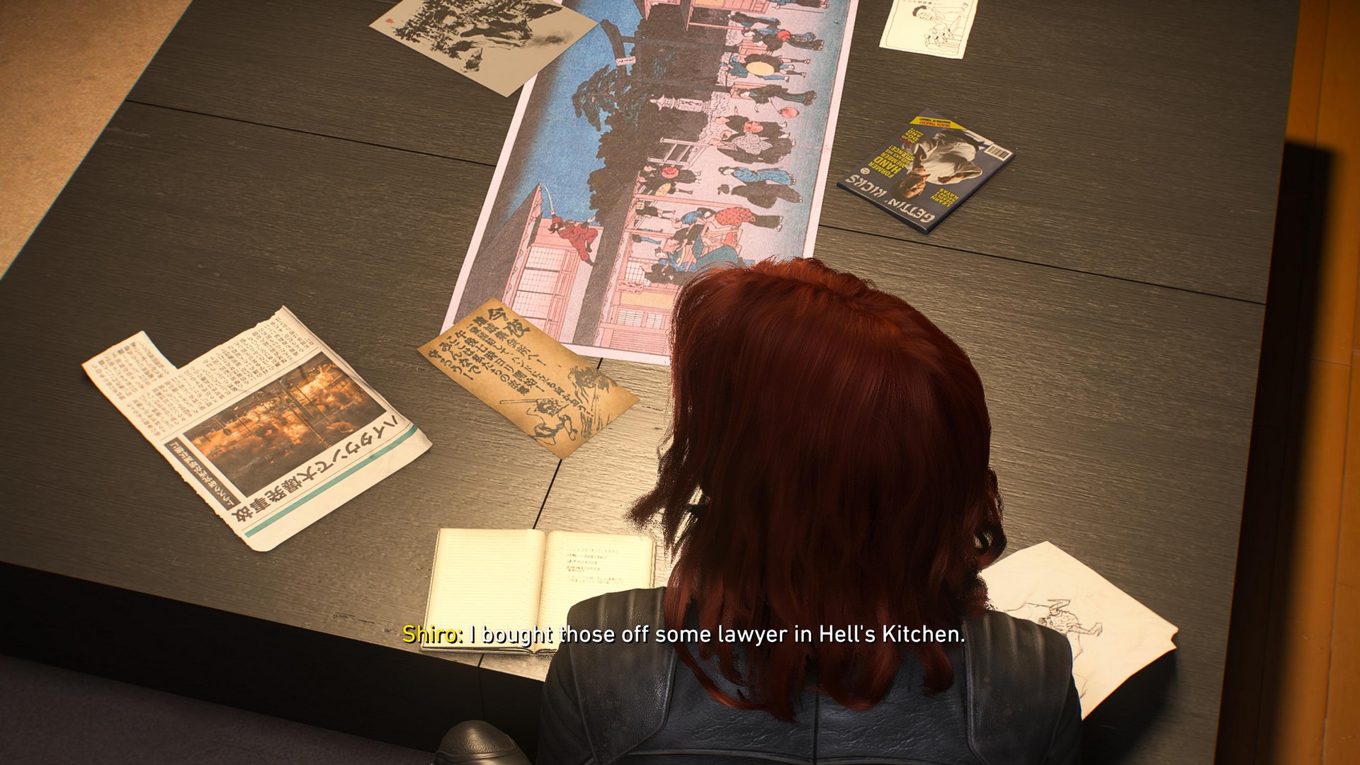 Jean Grey looks at clippings of The Hand ninja in Marvel's Wolverine on Shiro's table, who explains some of it comes from a lawyer from Hell's Kitchen