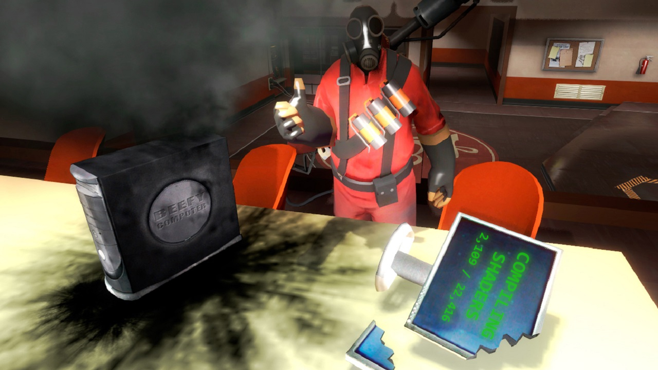 A pyro from TF2 next to a computer they smashed because the shaders took to long to compile