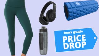 Alo Yoga leggings, Beats headphones, water bottle and foam roller