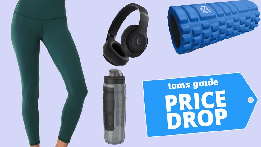 Alo Yoga leggings, Beats headphones, water bottle and foam roller