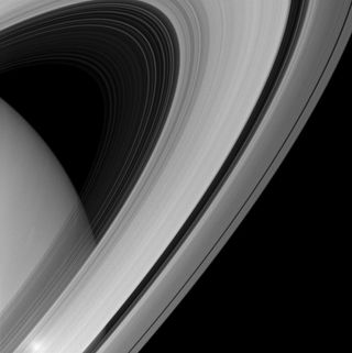 Saturn's rings appear to form a majestic arc over the planet in this image from the Cassini spacecraft. Image released September 9, 2013.