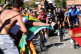 MOS SPAIN SEPTEMBER 04 LR Primoz Roglic of Slovenia and Team Jumbo Visma red leader jersey and Enric Mas Nicolau of Spain and Movistar Team attack in the breakaway during the 76th Tour of Spain 2021 Stage 20 a 2022km km stage from Sanxenxo to Mos Alto Castro de Herville 502m lavuelta LaVuelta21 on September 04 2021 in Mos Spain Photo by Tim de WaeleGetty Images