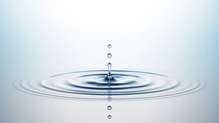 Water droplet impact causing ripples