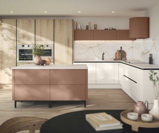 white, pale wood and terracotta coloured kitchen with white worktops and wood flooring