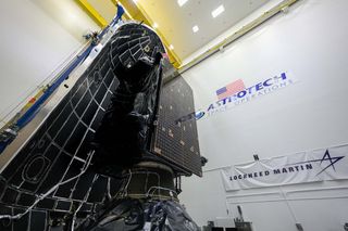 The Lockheed Martin-built GPS III SV05 navigation satellite is seen during fairing encapsulation work to prepare for its launch on a SpaceX Falcon 9 rocket on June 17, 2021 from Cape Canaveral Space Force Station in Florida.