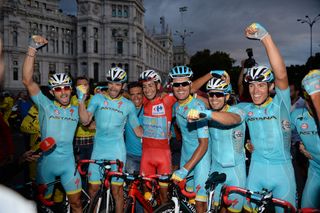 The Astana team celebrates Fabio Aru's overall victory