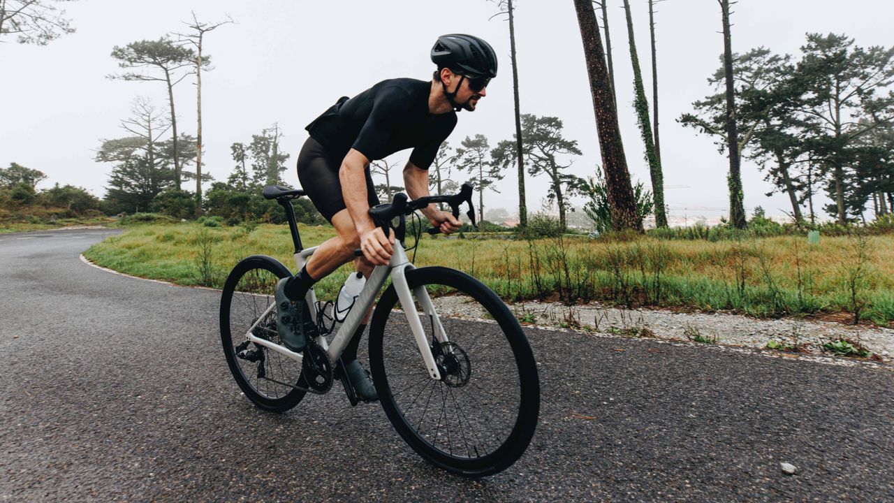 Cyclist riding new Specialized Roubaix SL8