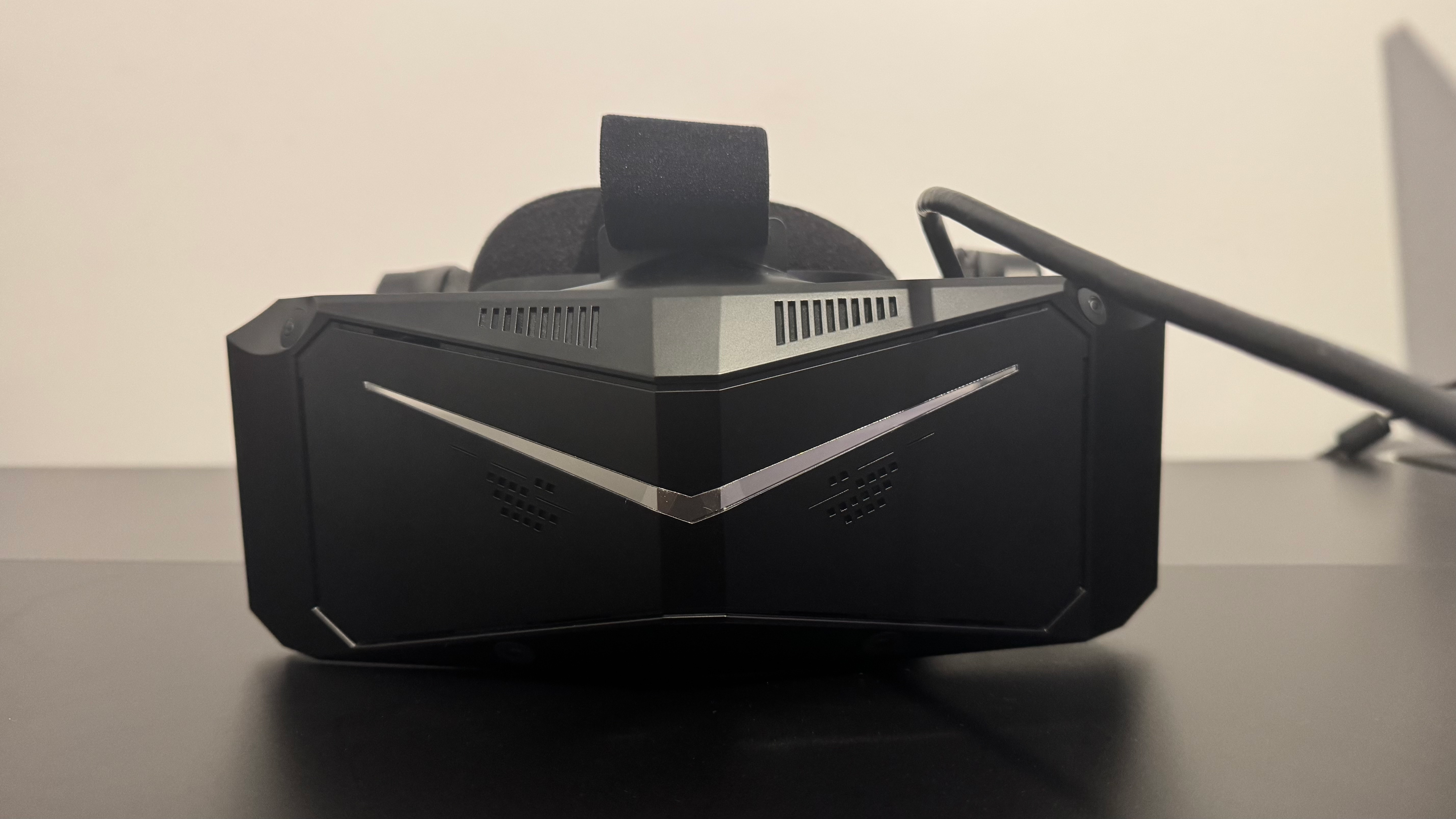 The Pimax Crystal Light VR headset on a table