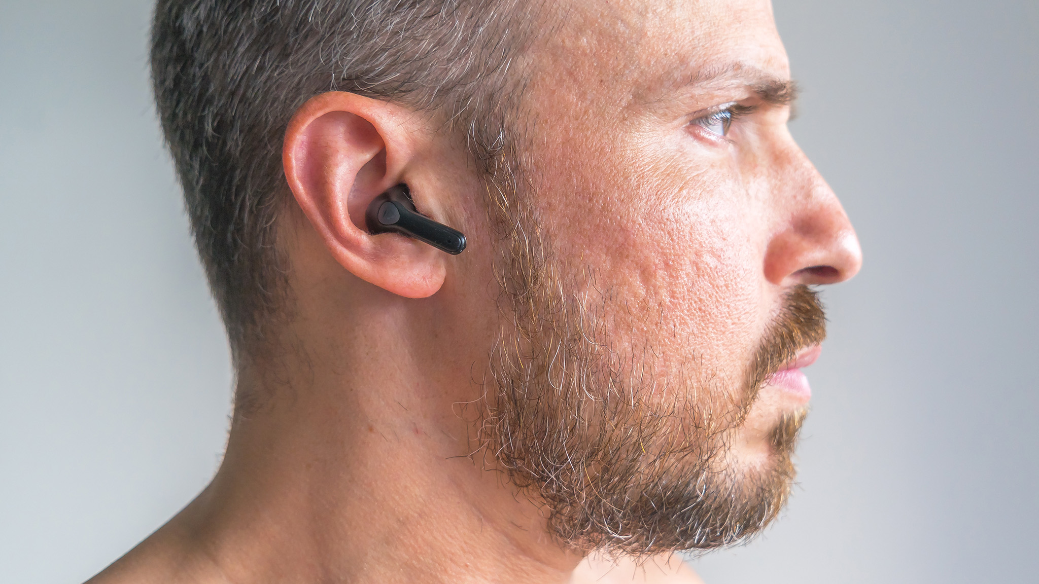 Wearing the Soundpeats Air3 Pro.