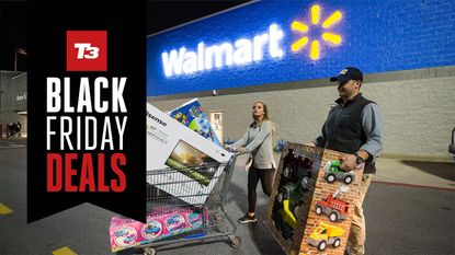 best walmart black friday deals: two people walking out of Walmart with a shopping trolley full of products