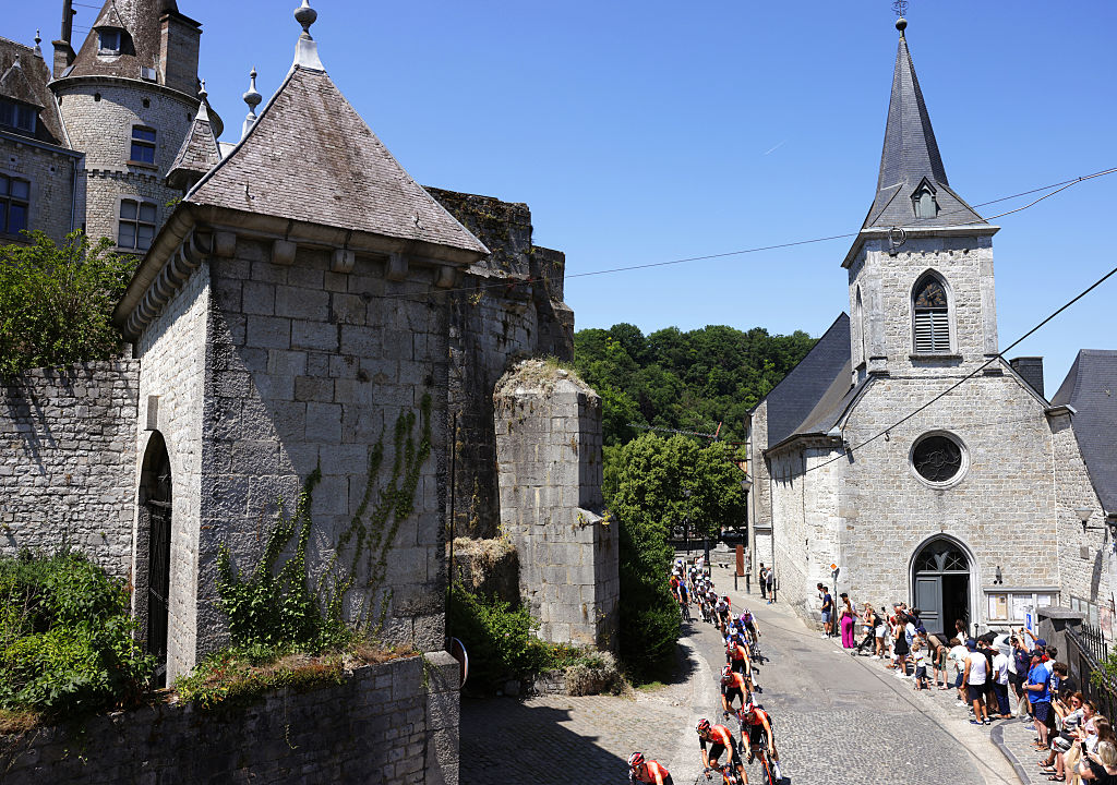 DURBUY, BELGIUM - JUNE 21: A general view of the peloton passing the old Durbuy Castle during the 94th Baloise Belgium Tour 2025, Stage 4 a 173km stage from Durbuy to Durbuy on June 21, 2025 in Durbuy, Belgium. (Photo by Rhode Van Elsen/Getty Images)