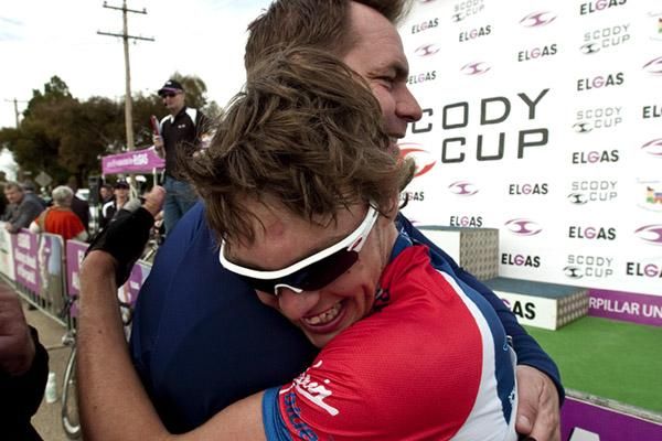 Thanks mate: Scott Law is congratulated by his Virgin Blue/RBS Morgans team-manager Henk Vogels after winning stage five in Lake Boga.