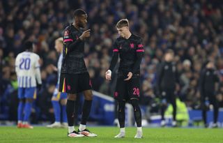 Cole Palmer of Chelsea argues with Tosin Adarabioyo of Chelsea during the Emirates FA Cup Fourth Round match between Brighton & Hove Albion and Chelsea at Amex Stadium on February 8, 2025 in Brighton, England.