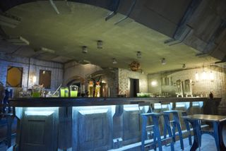 A futuristic, grimy-looking bar