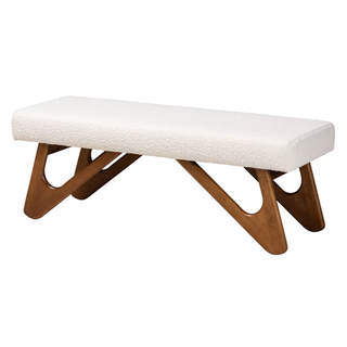 white boucle bench with wooden legs