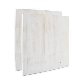 Two square whitewashed wall panels, with one in front of the other