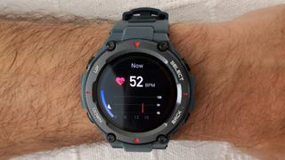 Heart rate shown on the Amazfit T-rex Pro watch worn by a freelancer