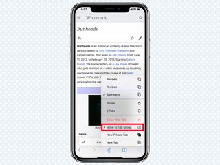 A red box is highlighting the Move to tab group option in Safari in iOS 15
