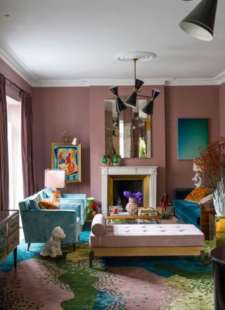 Pink living room with patterned pink and green carpet