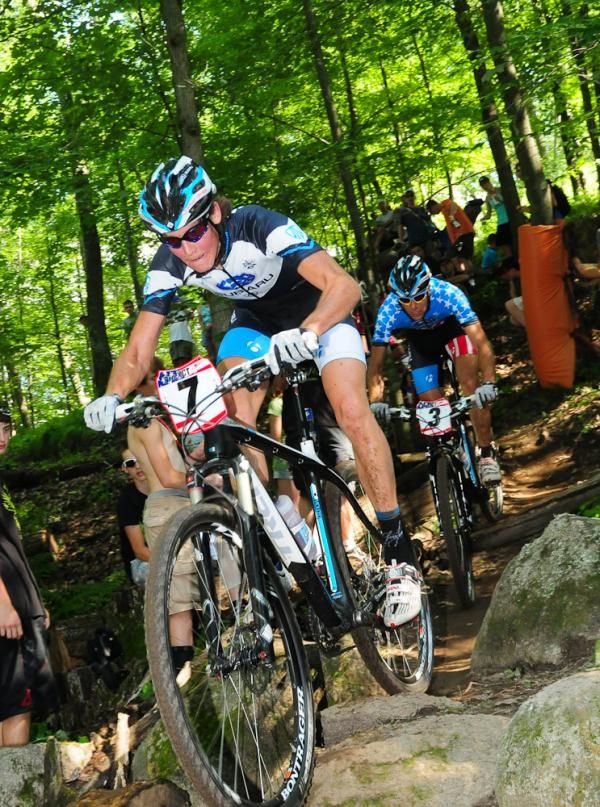 Sam Schultz (Subaru-Trek) staying close to Wells on the fifth lap.