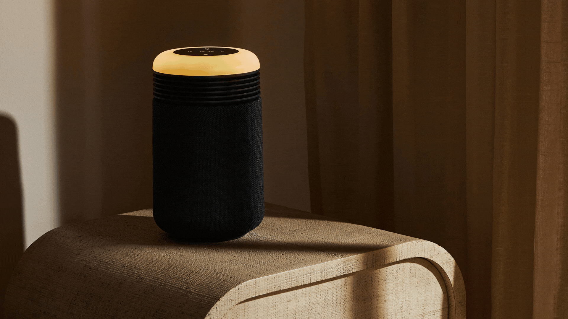 A GIF of black and beige air purifying sun clocks