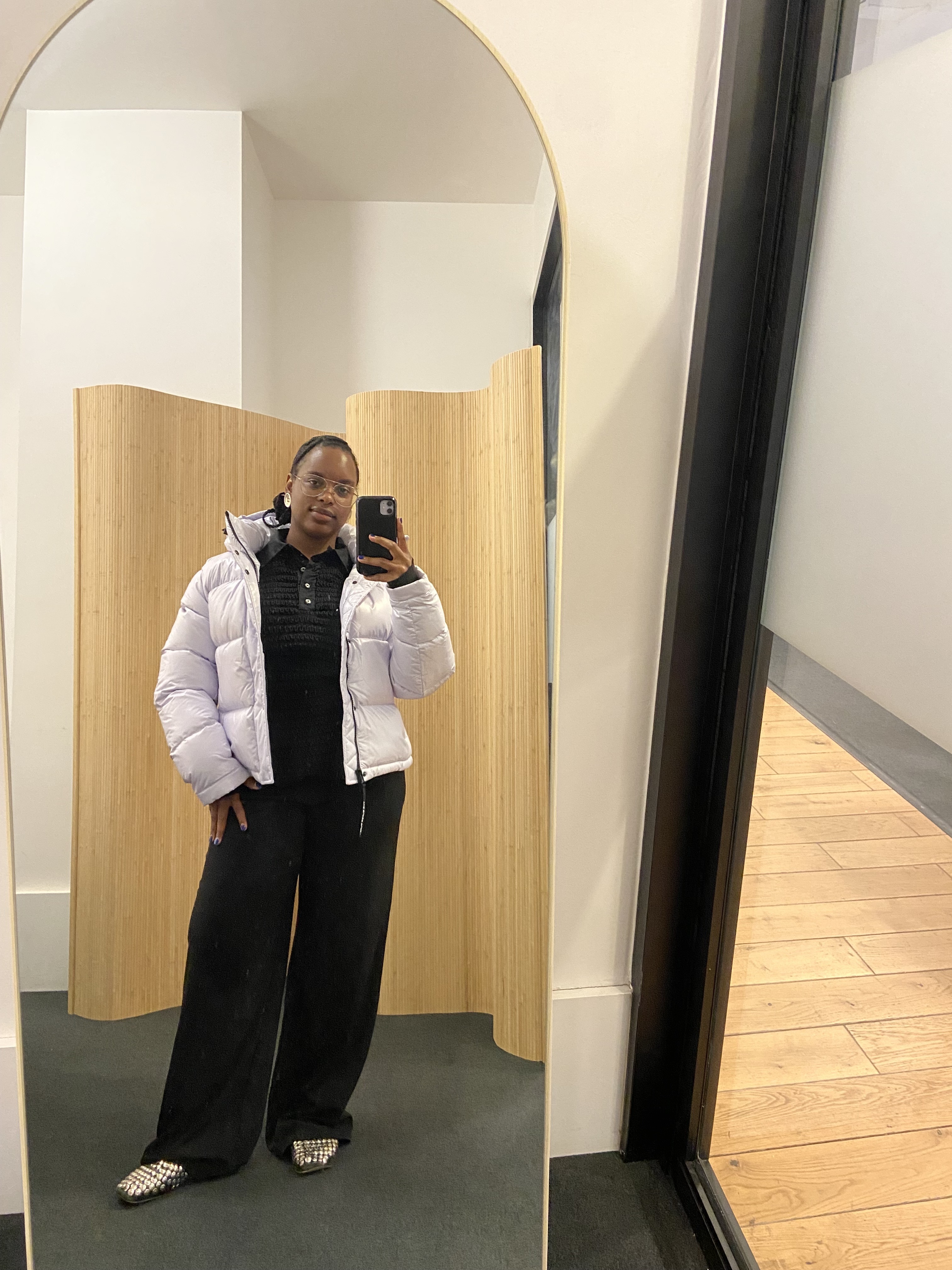 Who What Wear editors reviewing the Aritzia Super Puff.