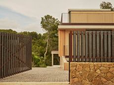 Spanish house Cala Tamarit, textured house among nature
