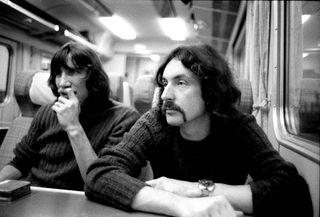 Roger and Nick on a train to Edinburgh, DSOTM tour 1974. On the journey back to London Pink Floyd and crew took over a whole sleeper train, which saved on hotels and was tremendous fun in an Enid Blyton sort of way!