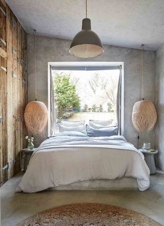 Rustic bedroom with built in wardrobes made from reclaimed wood