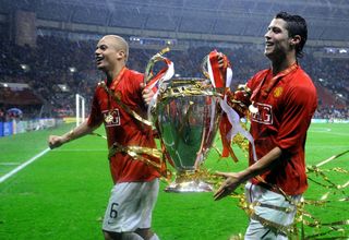 Cristiano Ronaldo celebrates with Wes Brown following the Champions League win in 2008.