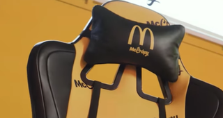 Closeup of the headrest on the yellow and black McDonald's McCrispy Ultimate Gaming Chair.