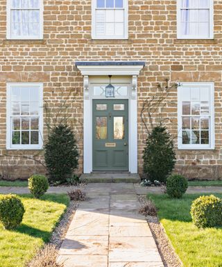 Exterior eggshell paint on front door by Graham&Brown