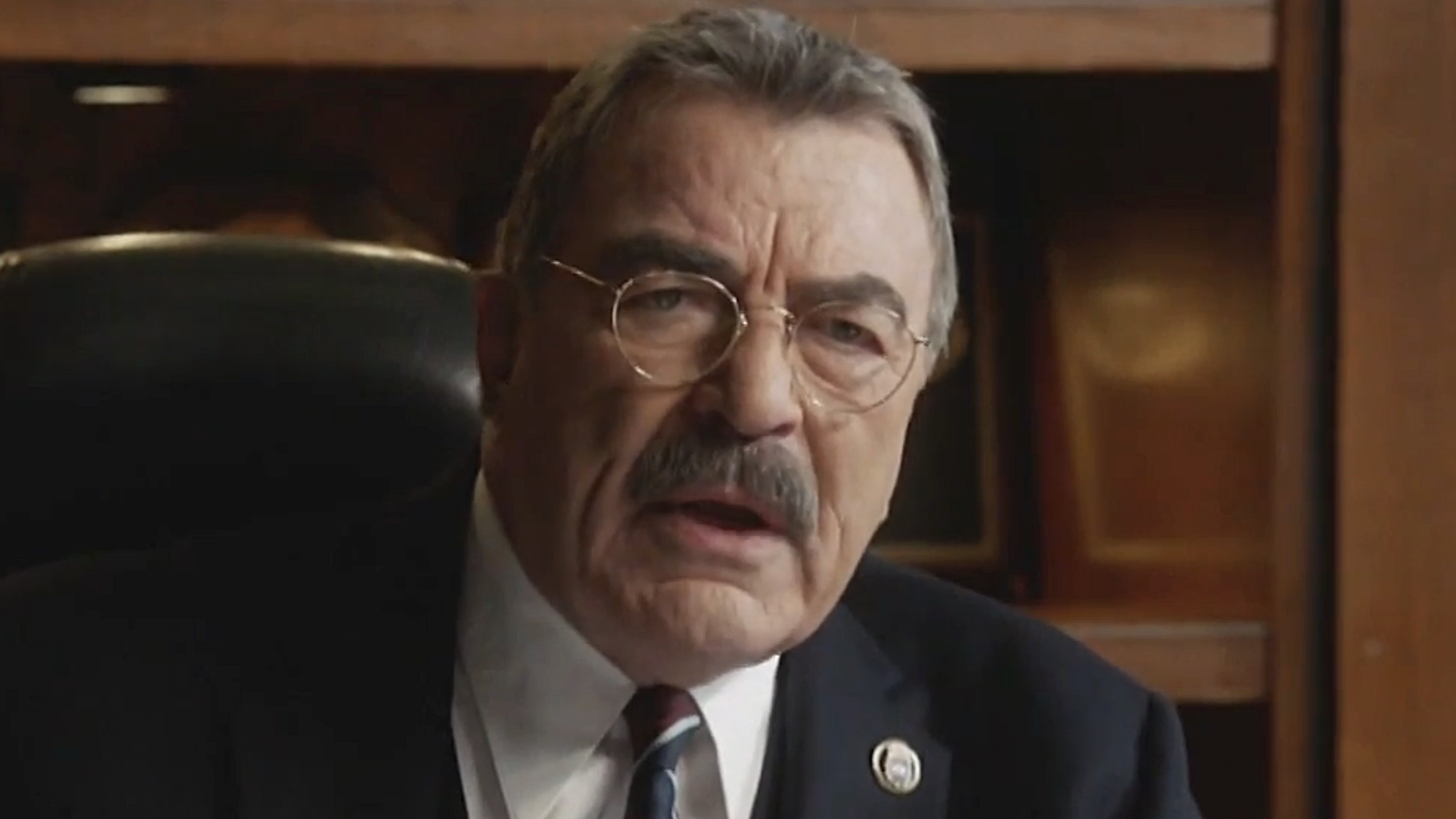 Frank sitting behind desk in Blue Bloods Season 14